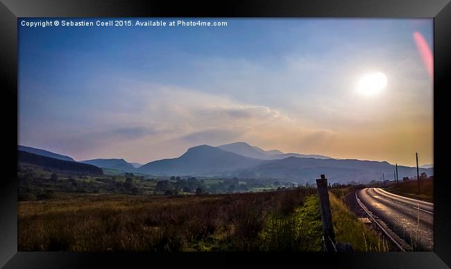 Snowdonia on a misty day Framed Print by Sebastien Coell