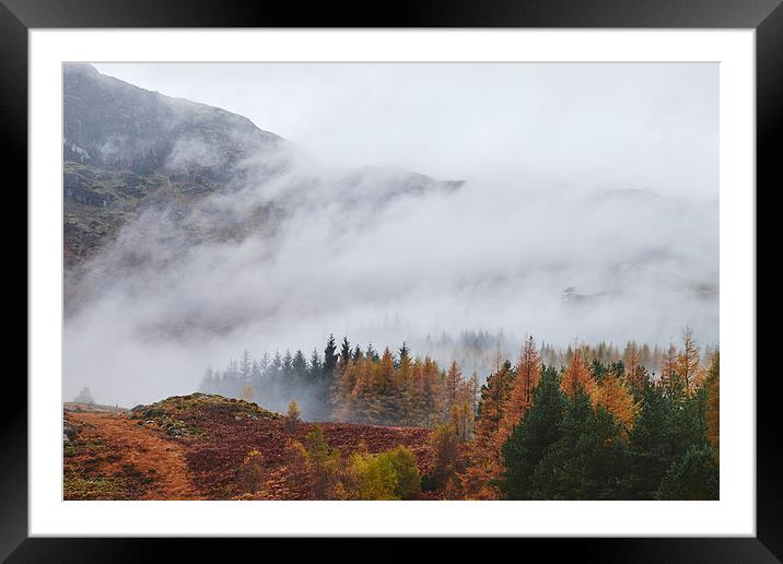 Rain clouds sweeping through the mountains near Bl Framed Mounted Print by Liam Grant