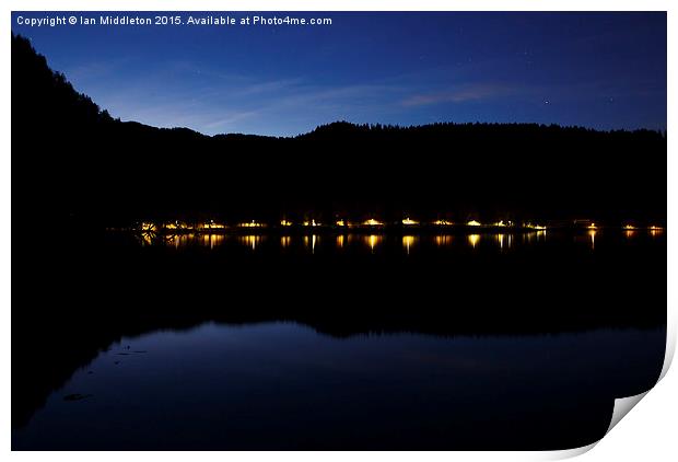 View across Lake Bled at night Print by Ian Middleton