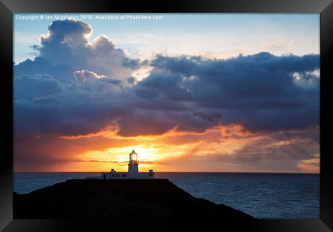 Sunset at Strumble Head Lighthouse Framed Print by Ian Middleton