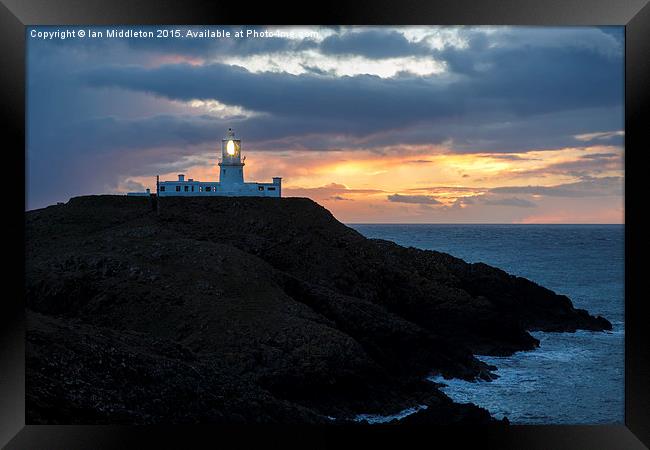 Sunset at Strumble Head Lighthouse Framed Print by Ian Middleton