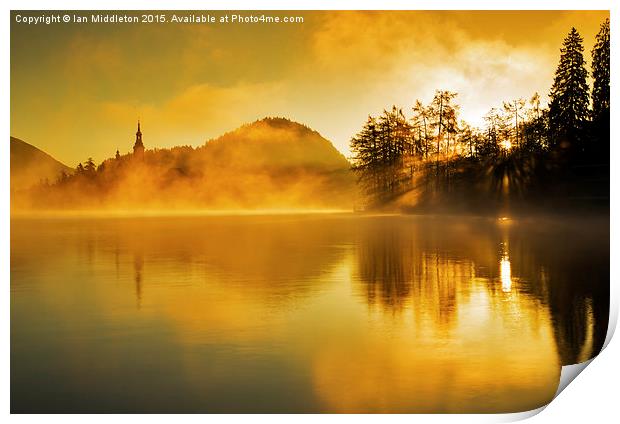 Misty sunrise at Lake Bled Print by Ian Middleton