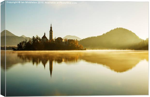 Morning light at Lake Bled Canvas Print by Ian Middleton