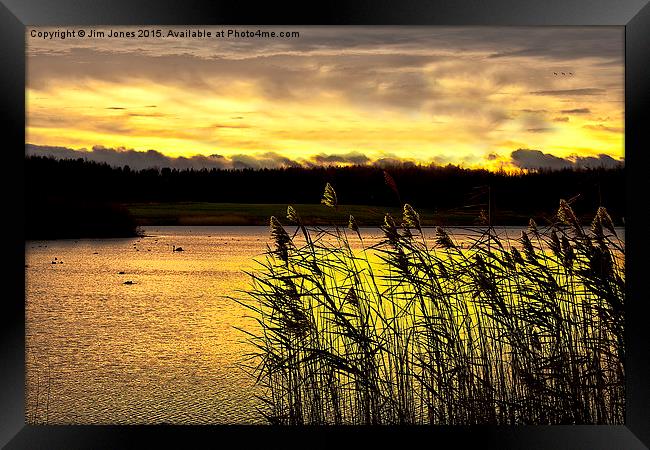  Early morning glow over the lake Framed Print by Jim Jones