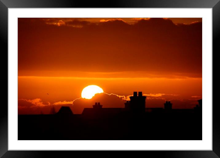  sun playing with the horizon. Framed Mounted Print by Carl Harlott