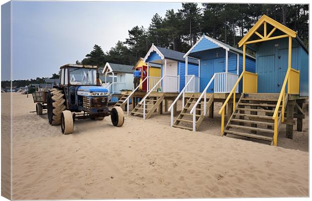 Tractor and Beach Huts Canvas Print by Stephen Mole