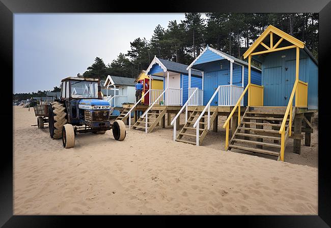 Tractor and Beach Huts Framed Print by Stephen Mole