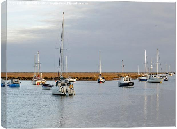 Evening approaches at Wells next the Sea Harbour N Canvas Print by john hartley