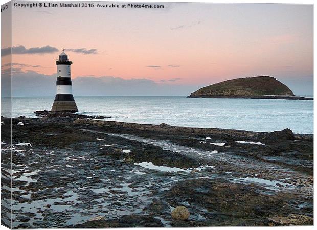  Penmon Lighthouse and Puffin Island. Canvas Print by Lilian Marshall