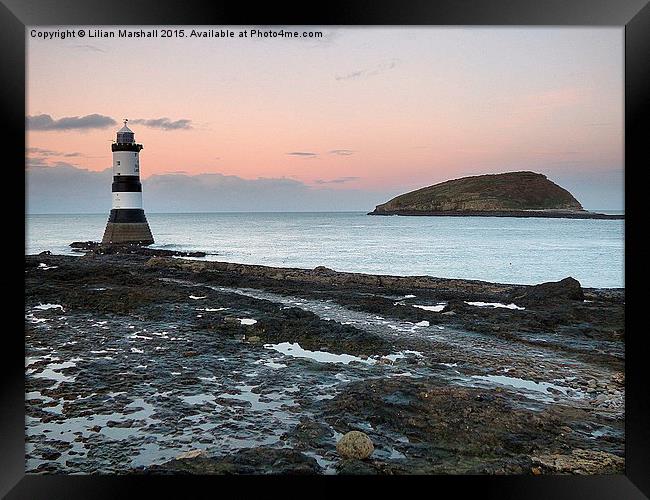  Penmon Lighthouse and Puffin Island. Framed Print by Lilian Marshall