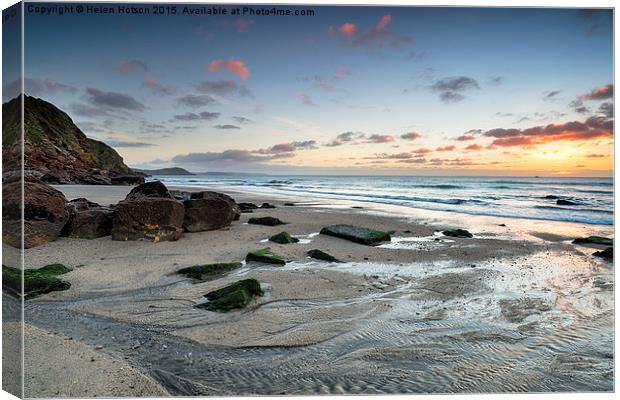 Sunrise at Pentewan on the Cornish Coast Canvas Print by Helen Hotson