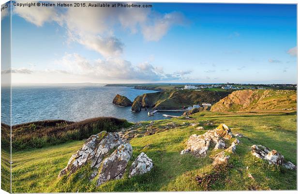 Mullion Cove in Cornwall Canvas Print by Helen Hotson