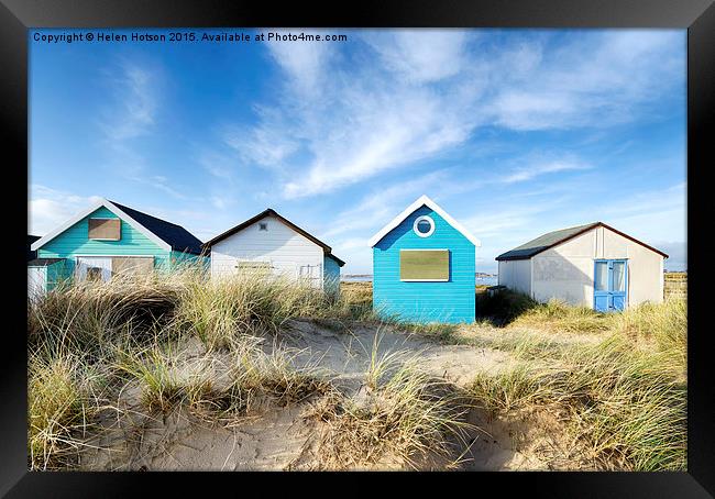 Beach Huts Framed Print by Helen Hotson