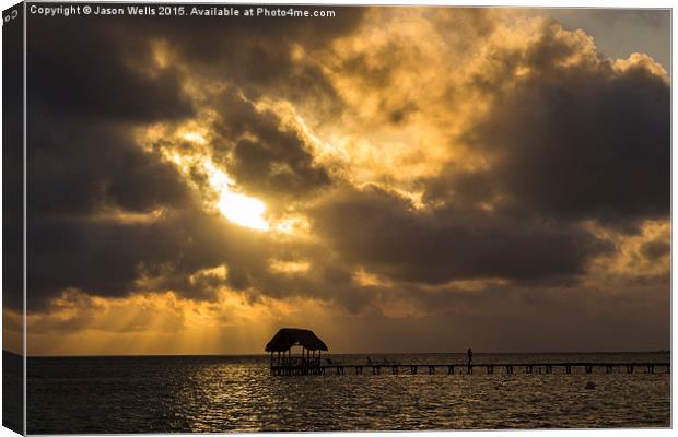 Rays of sun above a jetty Canvas Print by Jason Wells