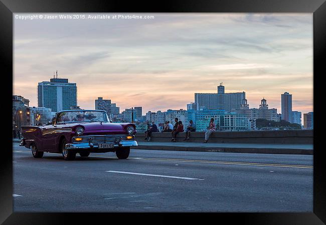 Tourists in a vintage car on the Malecon Framed Print by Jason Wells