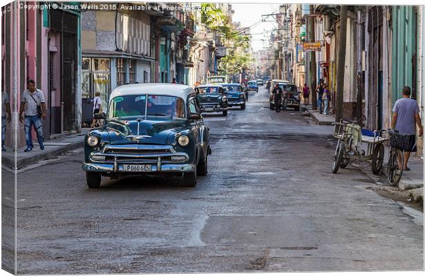 Facing a line of taxi's in Centro Havana Canvas Print by Jason Wells