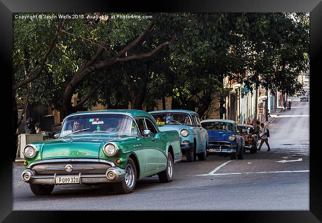 Vintage cars in Havana climbing a hill Framed Print by Jason Wells