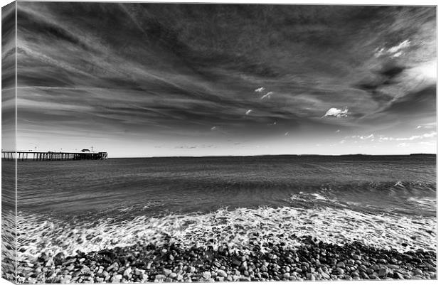  Piering out to sea Canvas Print by Andrew Richards