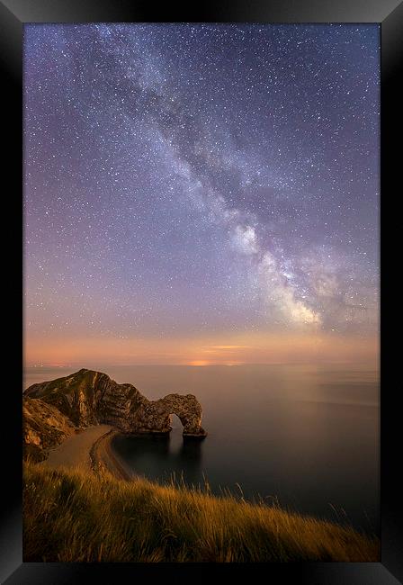  The Milky way over Durdle Door in Dorset Framed Print by Shaun Jacobs