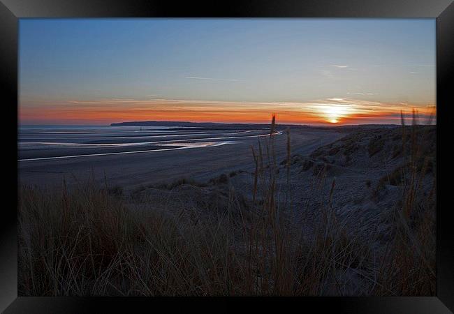  Sun going down on Camber beach Framed Print by Stephen Prosser