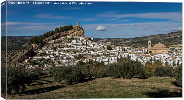  Two churches at mountain village in Spain Canvas Print by Philip Pound