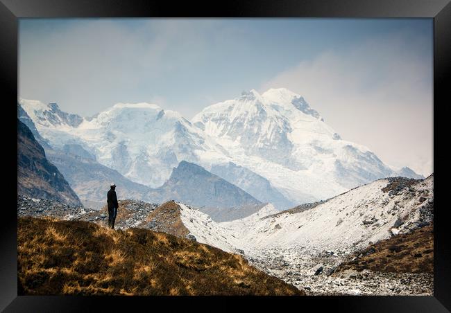 A man contemplates the size of Kanchenjunga Framed Print by Brent Olson