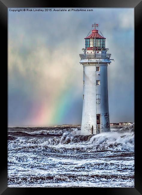  The Lighthouse and Rainbow Framed Print by Rick Lindley