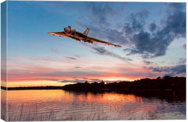 Vulcan low over a sunset lake Canvas Print by Gary Eason