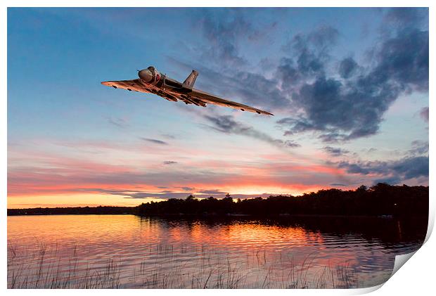Vulcan low over a sunset lake Print by Gary Eason