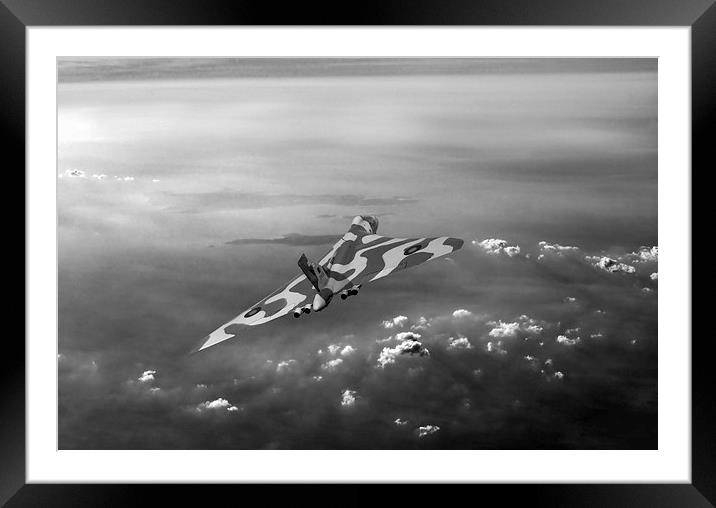Vulcan over the Channel XH558 black and white vers Framed Mounted Print by Gary Eason