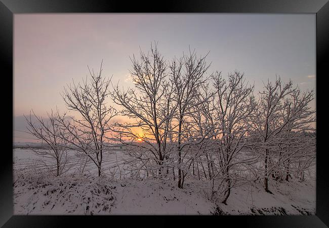  Sunrise with Snowing Framed Print by Ambir Tolang