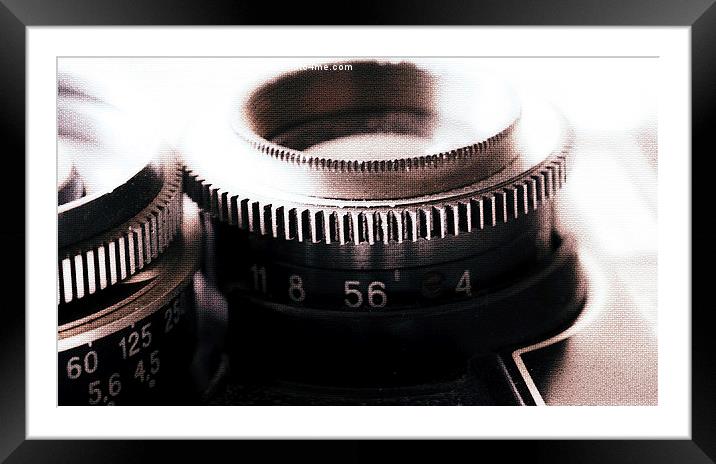  Old camera lens Framed Mounted Print by Mark Lovelock
