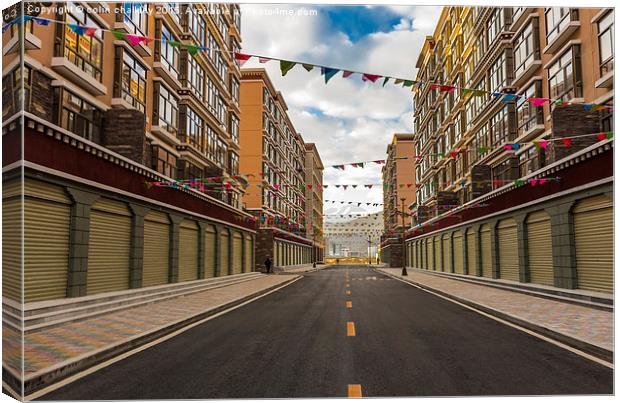  A Pristine Side street in Lhasa Canvas Print by colin chalkley
