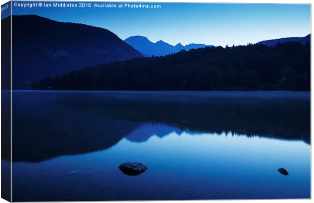 Dawn at Lake Bohinj in Slovenia Canvas Print by Ian Middleton