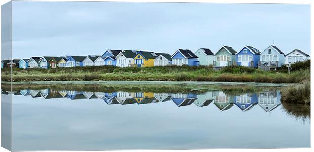  Beach huts reflected  Canvas Print by Shaun Jacobs