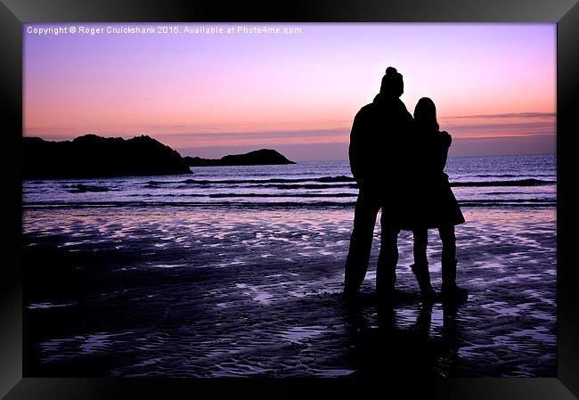  Sunset in North Wales, Newborough Framed Print by Roger Cruickshank