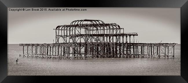 Brighton Pier and paddle boarder Framed Print by Len Brook