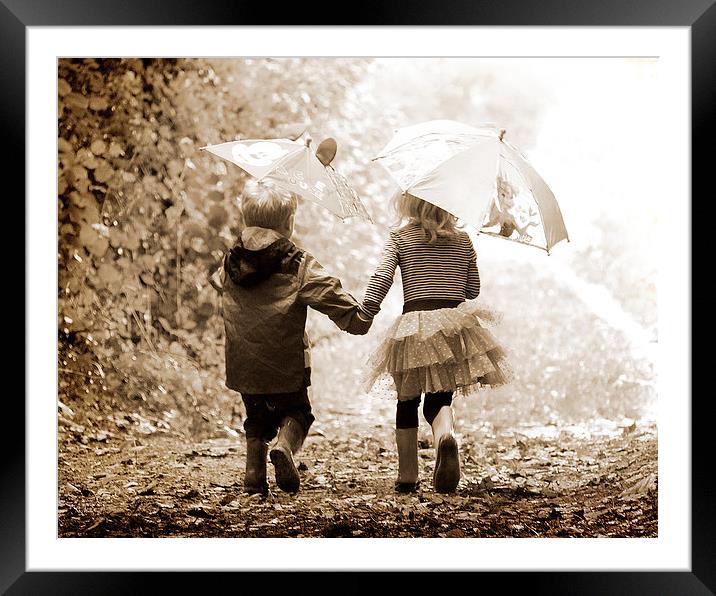 Children holding hands in sepia woods by Russell S Framed Mounted Print by Russell Scott-Skinner