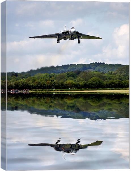  Vulcan XH558 over water Canvas Print by Tony Bates