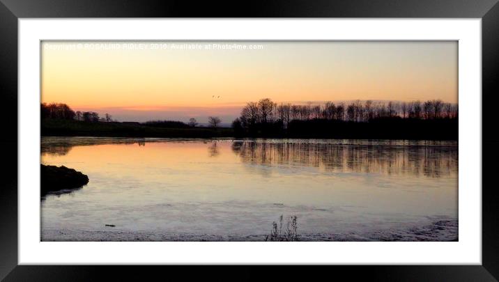 "Sunset across the frozen lake"  Framed Mounted Print by ROS RIDLEY