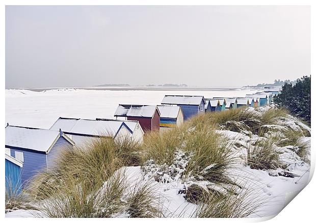 Beach huts and dunes covered in snow at low tide.  Print by Liam Grant