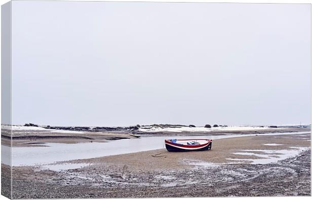 Boats and snow at low tide. Burnham Overy Staithe, Canvas Print by Liam Grant