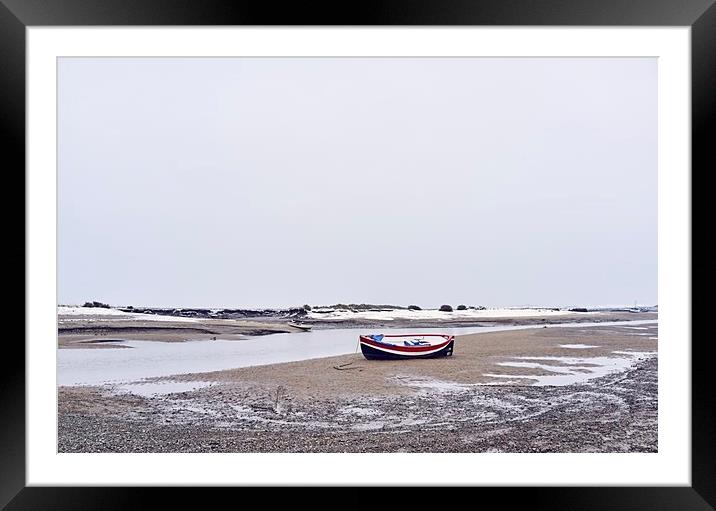 Boats and snow at low tide. Burnham Overy Staithe, Framed Mounted Print by Liam Grant