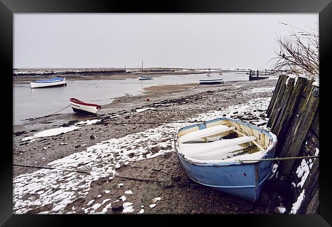 Boats and snow at low tide. Burnham Overy Staithe, Framed Print by Liam Grant