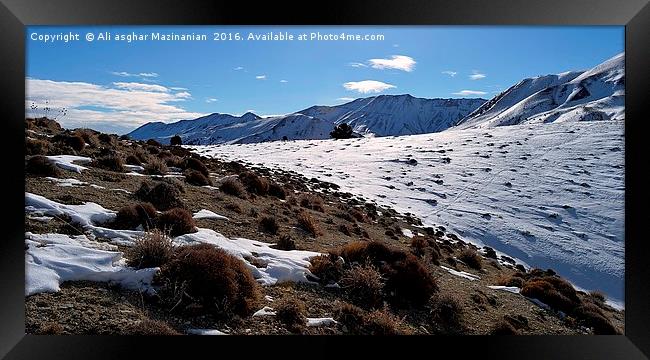 The beauty of snow on mountain, Framed Print by Ali asghar Mazinanian