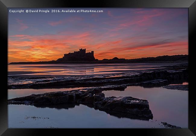 Bamburgh Castle Sunrise Framed Print by David Pringle