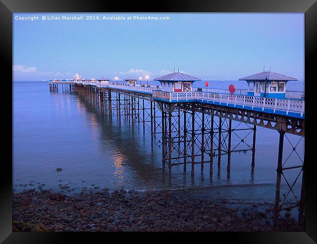 Llandudno Pier at Dusk.  Framed Print by Lilian Marshall