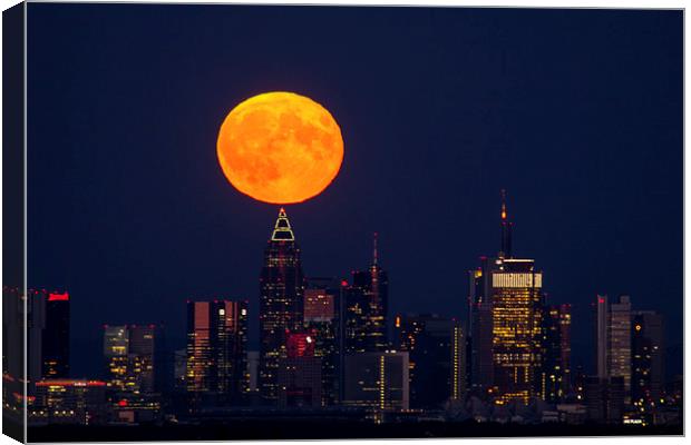 Moon rises over Frankfurt Canvas Print by Thomas Schaeffer