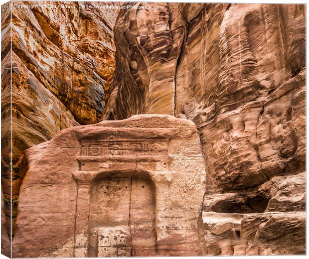 Relief Sculpture among the Rocks -  Petra Canvas Print by Tony Sharp LRPS CPAGB