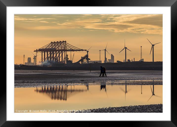 Reflection of people walking on the beach Framed Mounted Print by Jason Wells